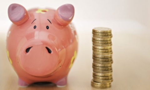Piggy bank and coins